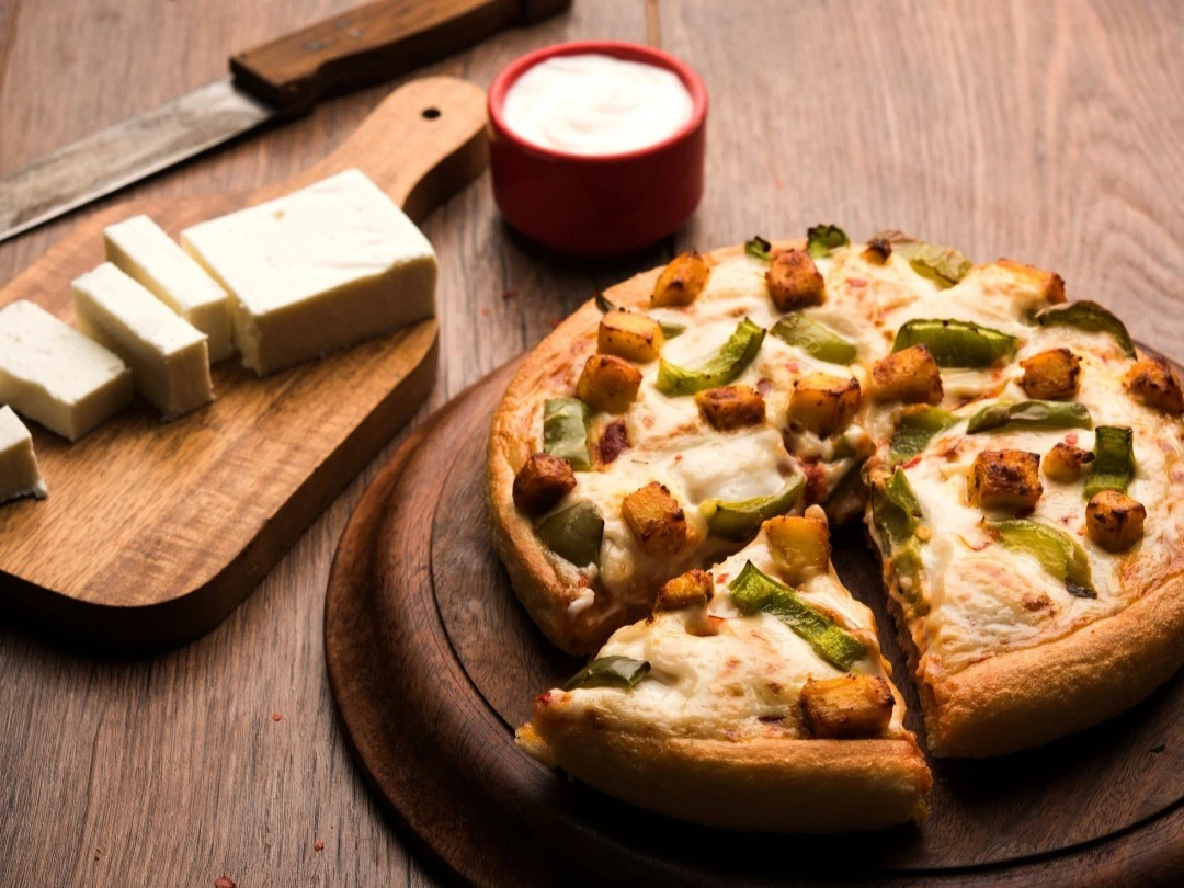 Authentic pizza and Indian cuisine at Pizza Milano & More - Best pizza and Indian restaurant in Edmonton, AB