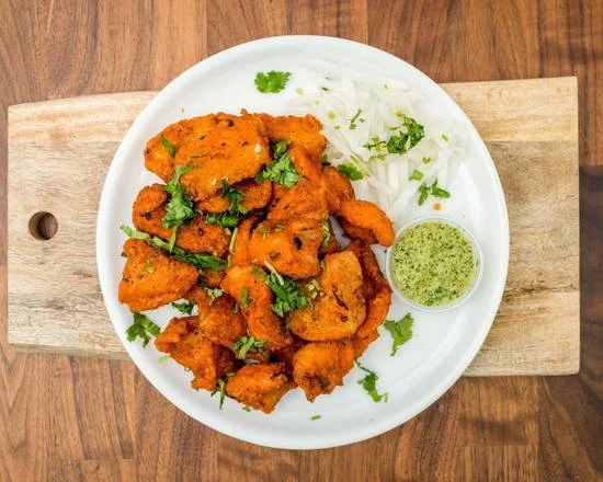 Crispy Fish Pakora Indian appetizer at Pizza Milano & More in Edmonton, AB